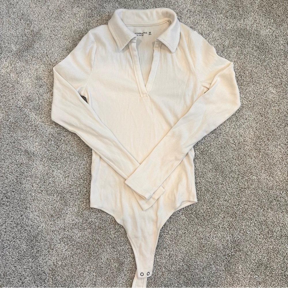 Ribbed long sleeved body suit